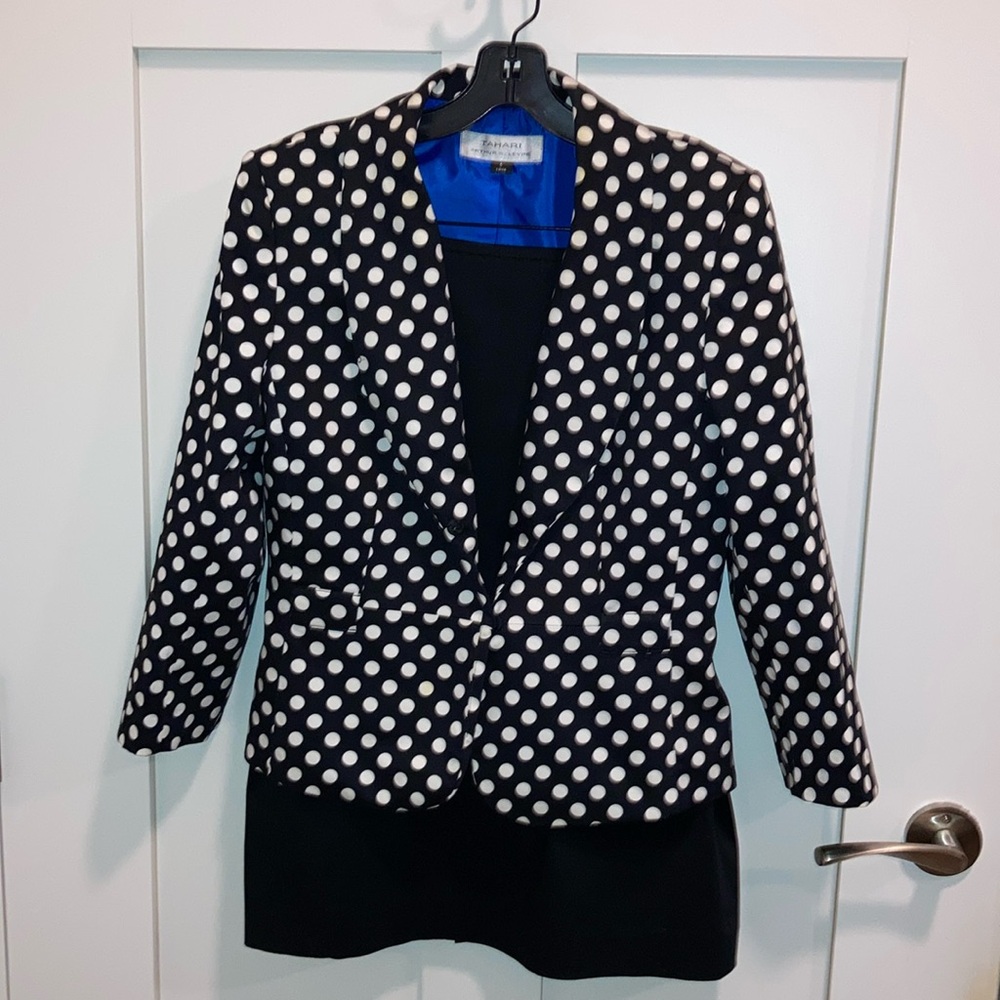 Women’s polka dot jacket and solid black skirt suit. Tahari.